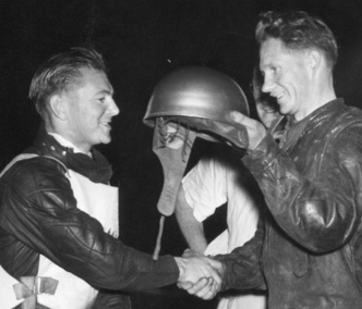 Rt:&nbsp;Ronnie Moore receives the SA.MRC Golden Helmet from Fred Wills after his win at Wembley in 1953.